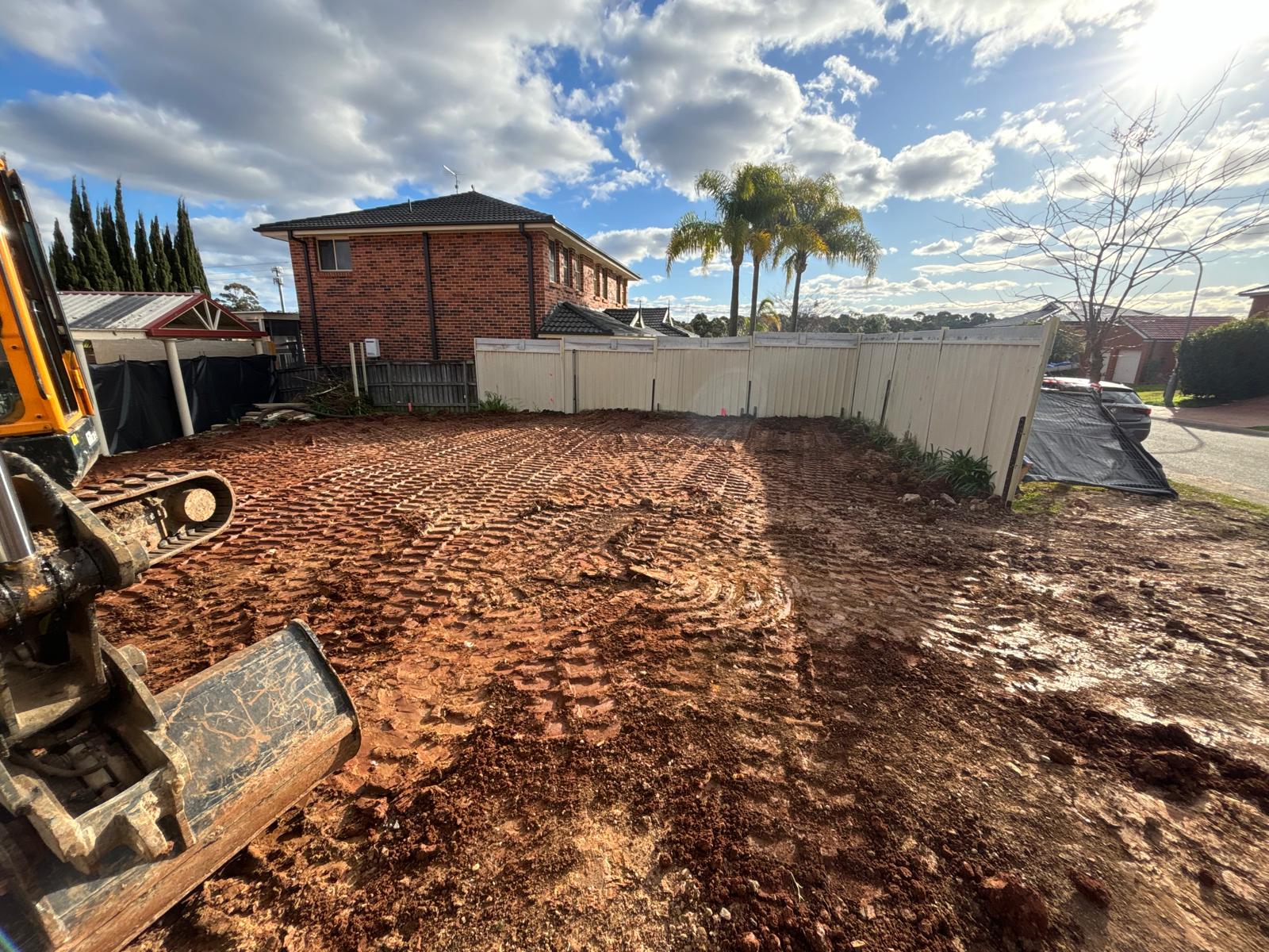 Front yard graded and tracked flat after completed pool excavation works